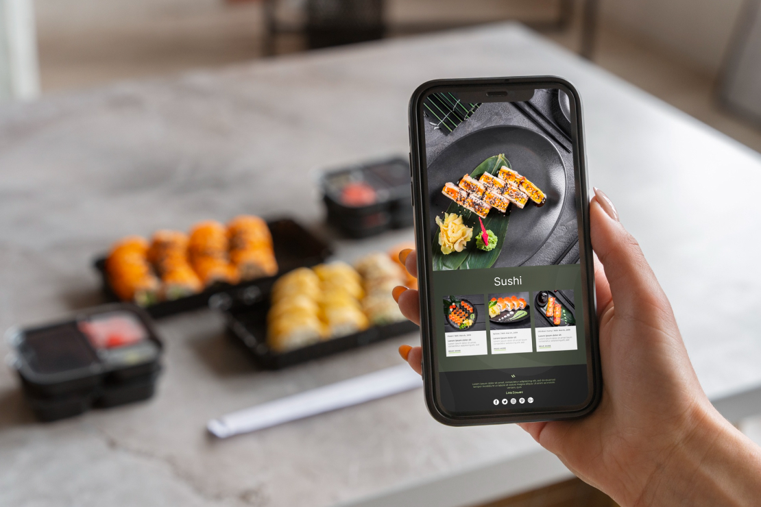 A smartphone displaying a nutrition tracking app, with sushi in the background, symbolizing AI-powered craving management.